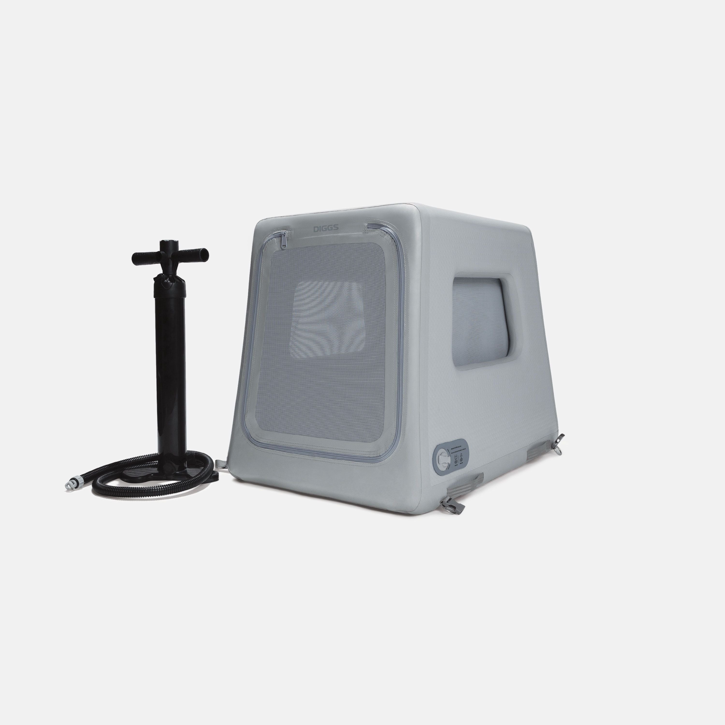 an inflated Enventur kennel next to its pump