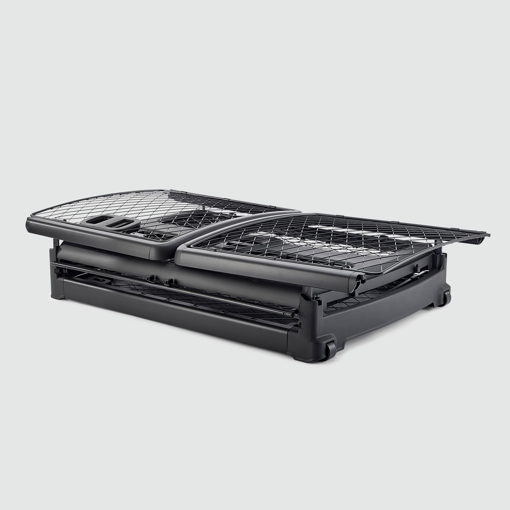 A folded Charcoal Revol crate sitting on a white background