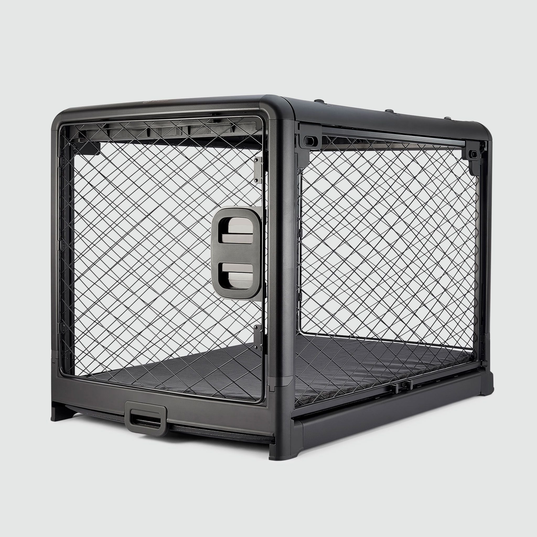 A Charcoal Black Revol Dog Crate pictured diagonally from the front on an offwhite background