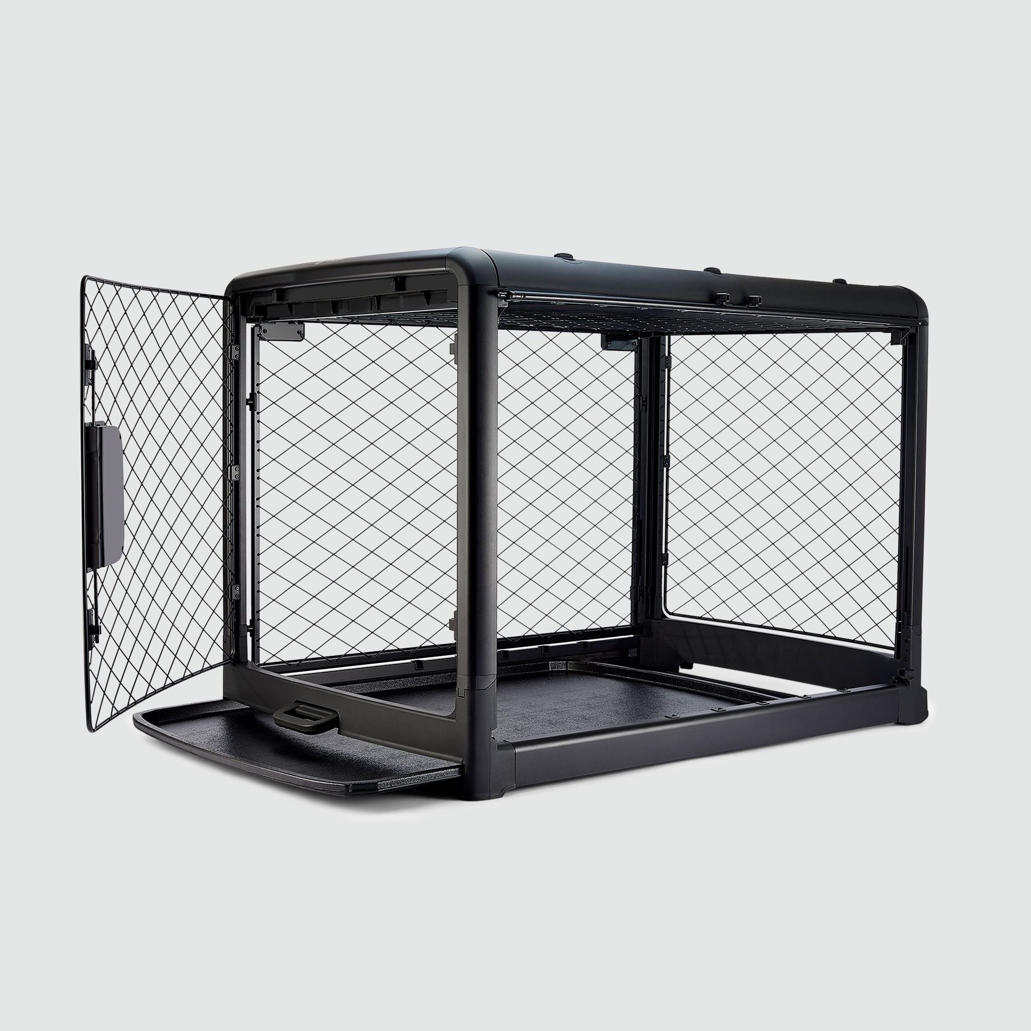 A black dog crate with a door open on a white background