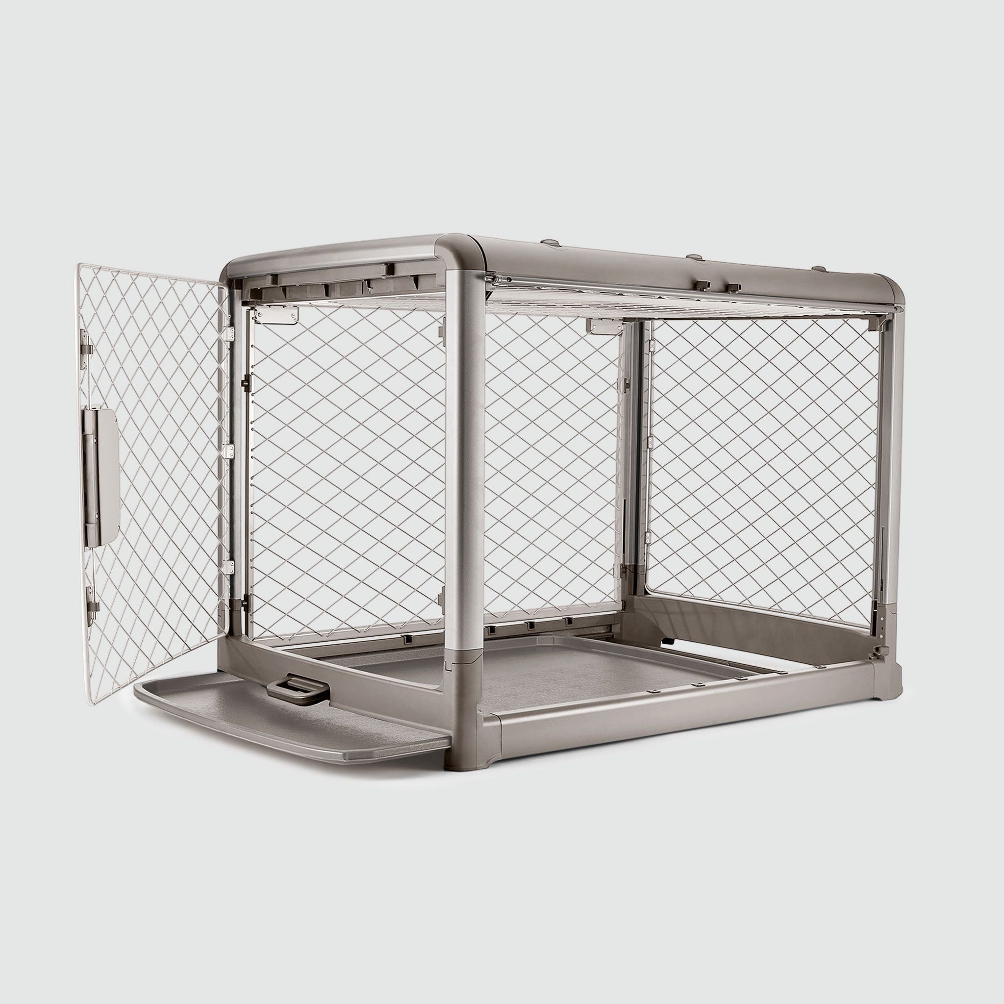 A side view shot of the open doors on the I/L Revol crate in Smoke color, while the tray at the bottom is pulled half out.