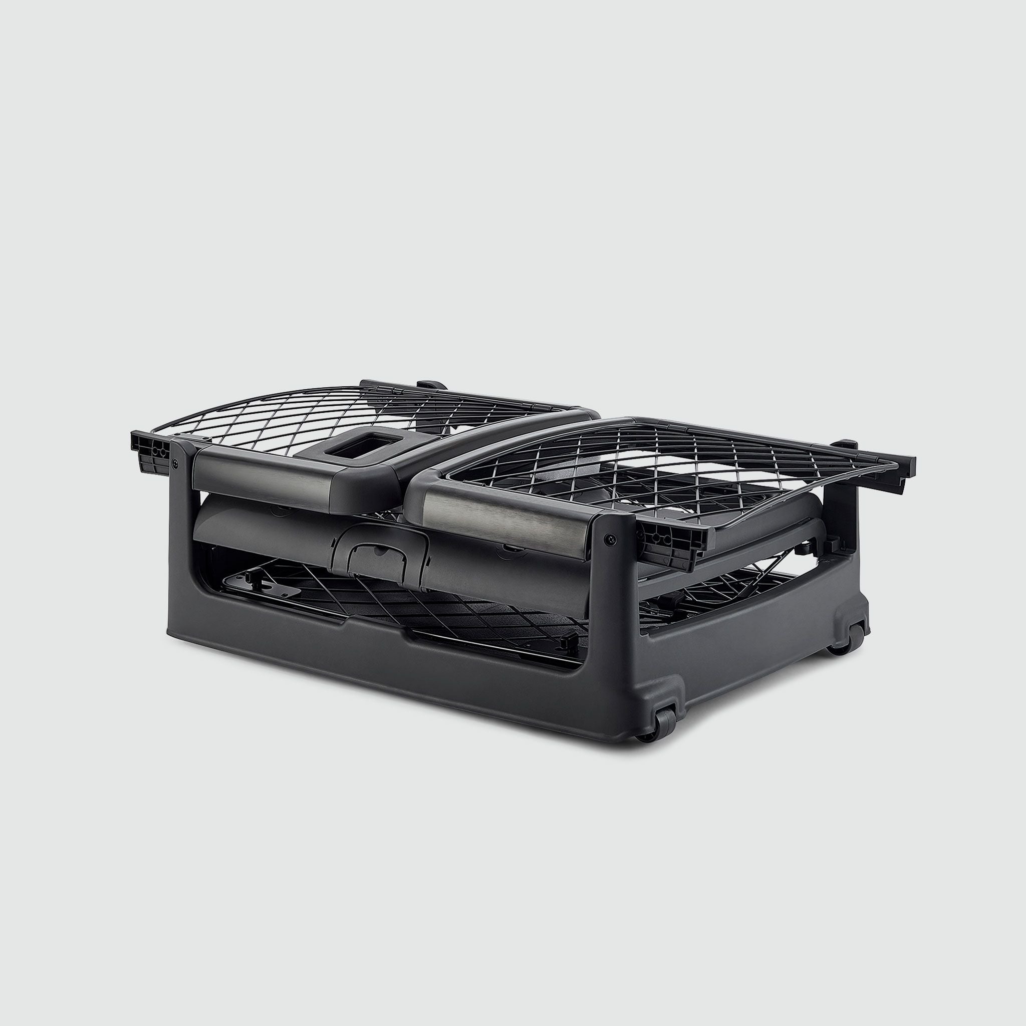 A folded Charcoal Revol crate sitting on a white background