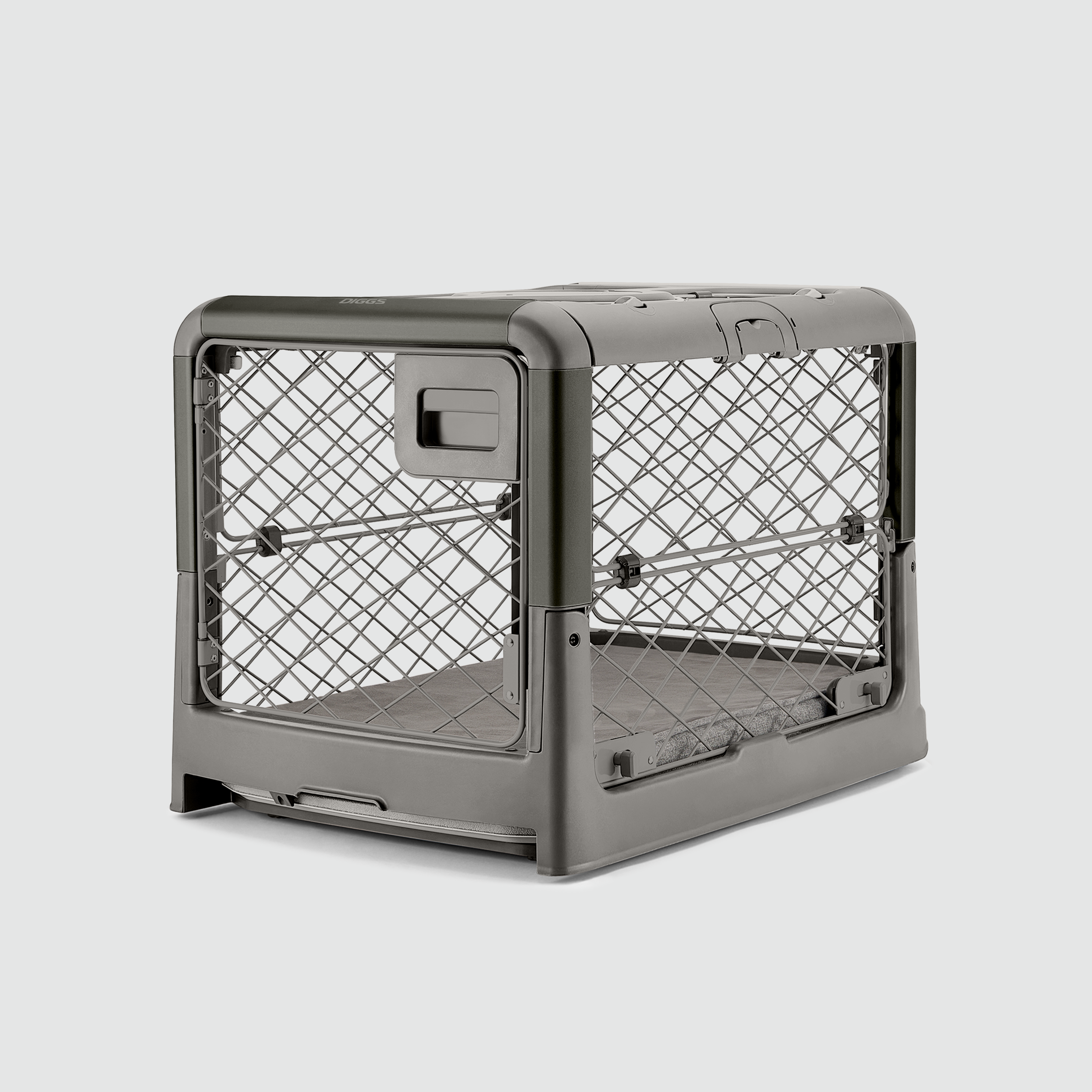 A Smoke Grey Revol Dog Crate pictured diagonally from the front on an offwhite background