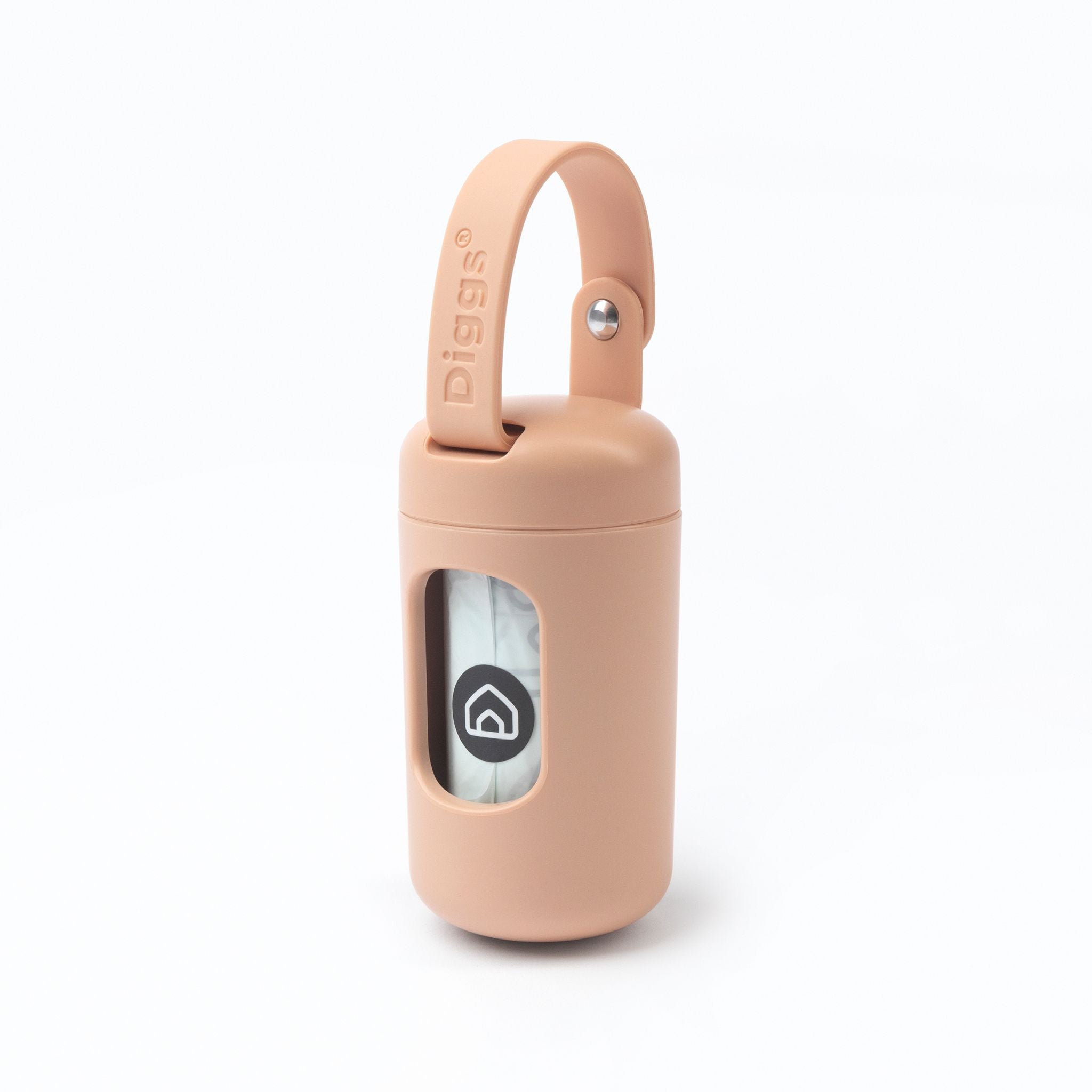 a close up of a blush poop bag dispenser on a white background