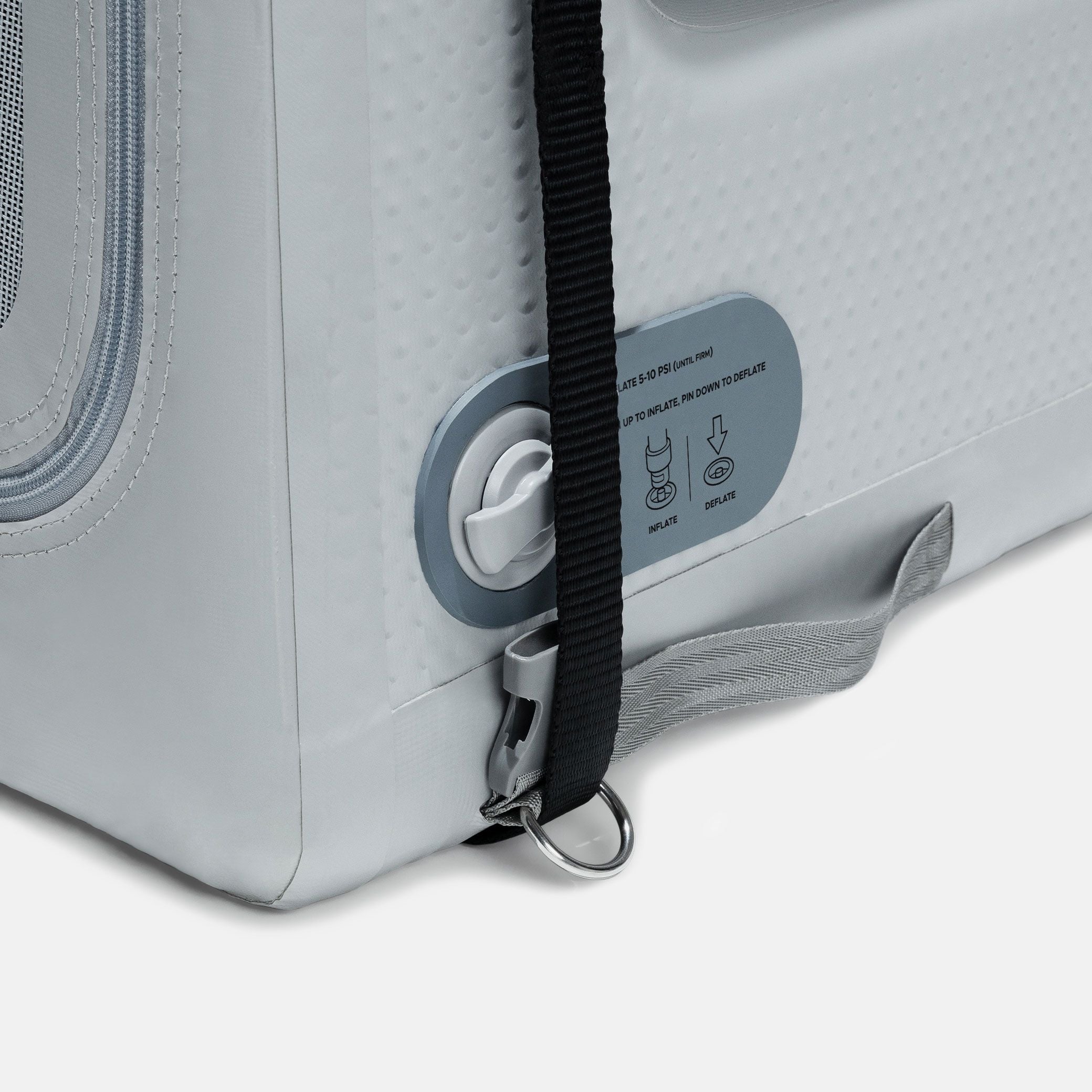 a close up of an Enventur with the tie-down strap loop through the D-ring