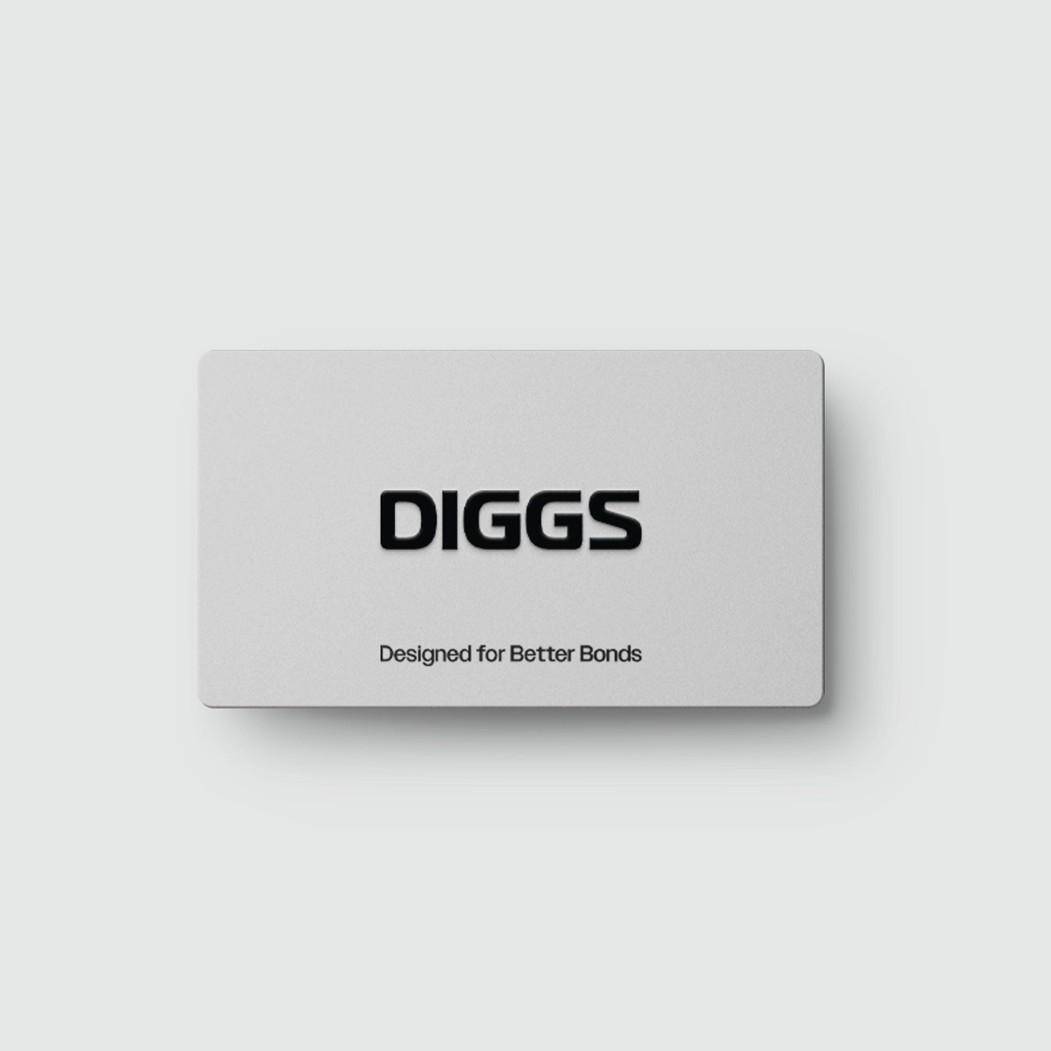 a white card with the words DIGGS on it