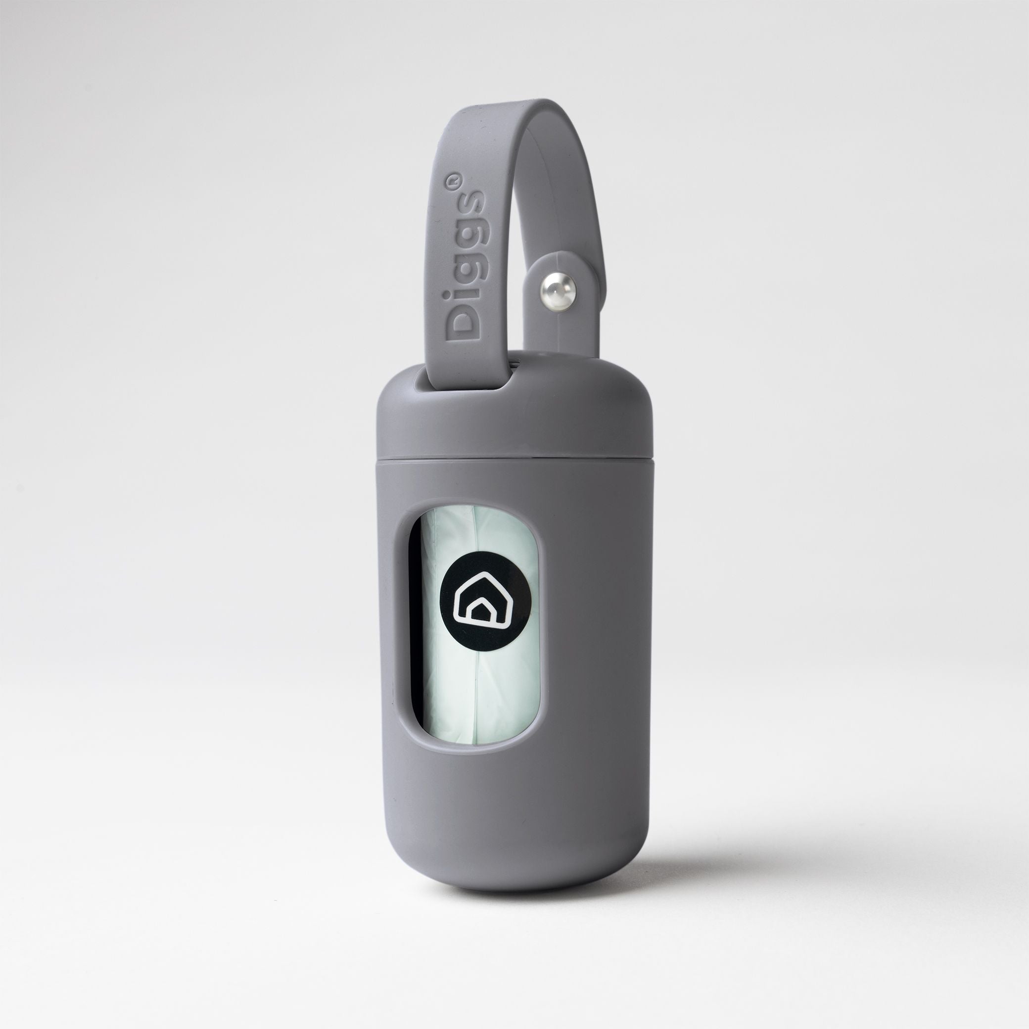 a slate poop bag dispenser standing on a white background