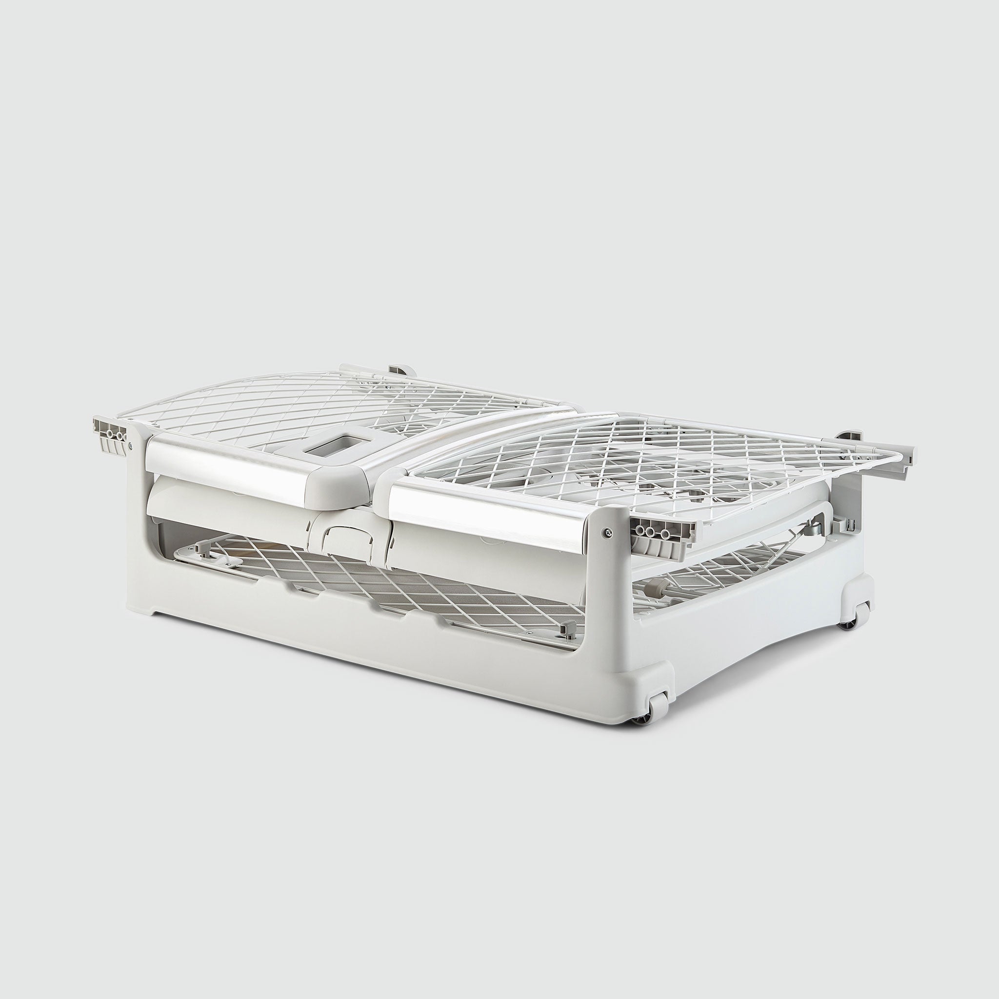 A folded Ash Revol crate sitting on a white background