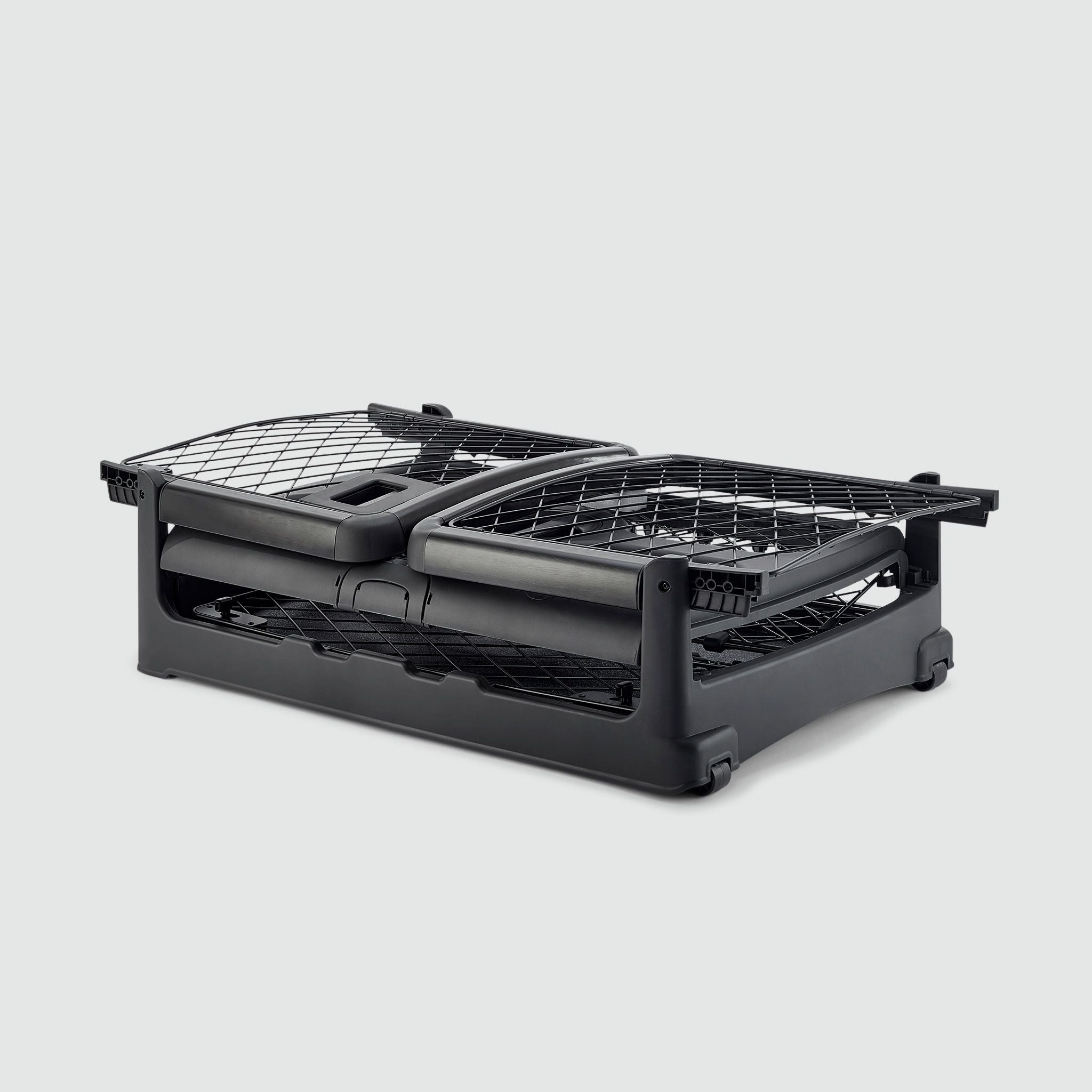 A folded Charcoal Revol crate sitting on a white background