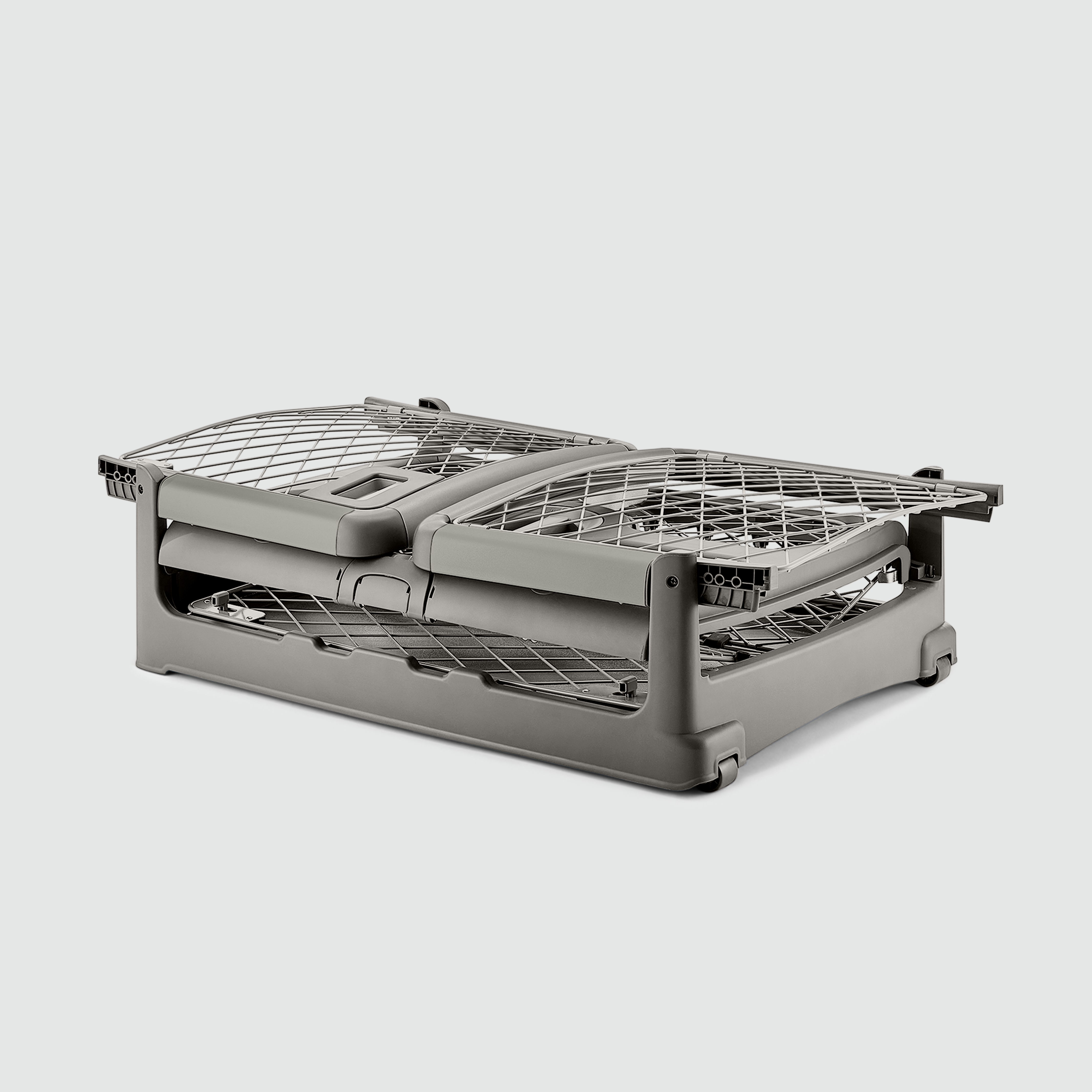 A folded Revol crate sitting on a white background